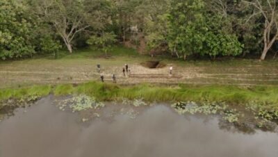 Imagen que representa y simboliza y refuerza el contenido de la noticia: Maquinaria pesada en represa El Caimán para evitar desbordamiento